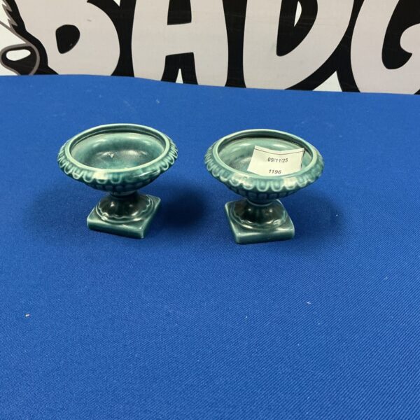 Pair of vintage Elaine Goddard pottery candle holders with green glaze.