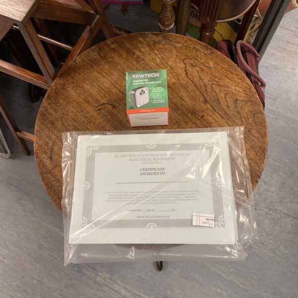 Electrical safety testing certificates and Kewtech plug socket tester lot.