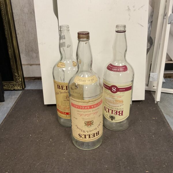 Lot of three empty 4.5ltr Bells Whiskey bottles for collectors.