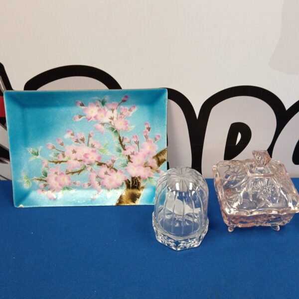 Vintage enamel tray with cut glass birdcage and crystal bird.