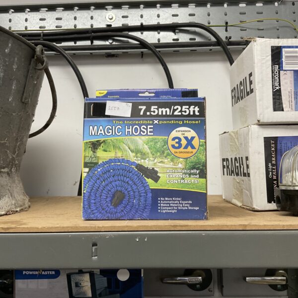 7.5mm expanding garden hose, coiled and ready for use.