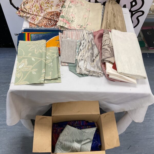 Assorted fabric offcuts for sewing and crafting projects.