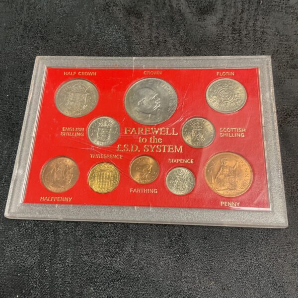 Farewell to the £.s.d. System coin collection featuring various British coins.
