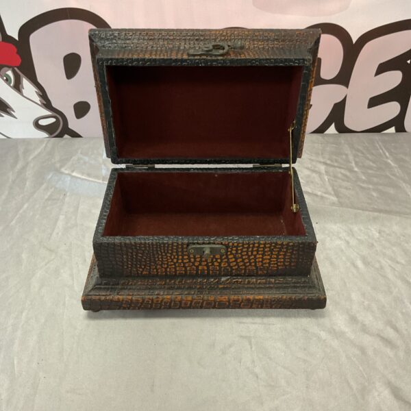 Vintage faux crocodile jewellery box with hinged lid.