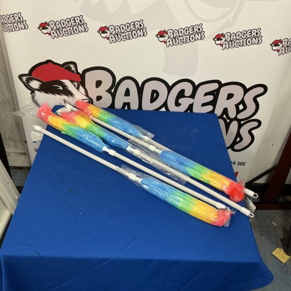 Lot of five colourful feather dusters for cleaning.