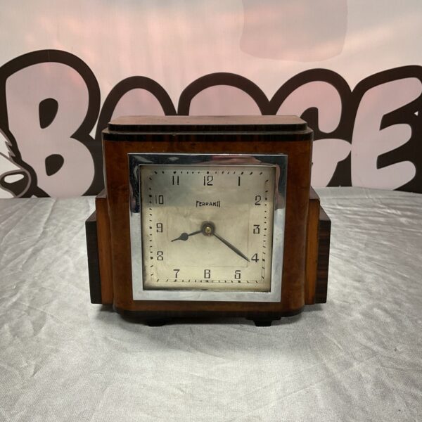 Vintage Ferranti Art Deco mantle clock with wooden case.