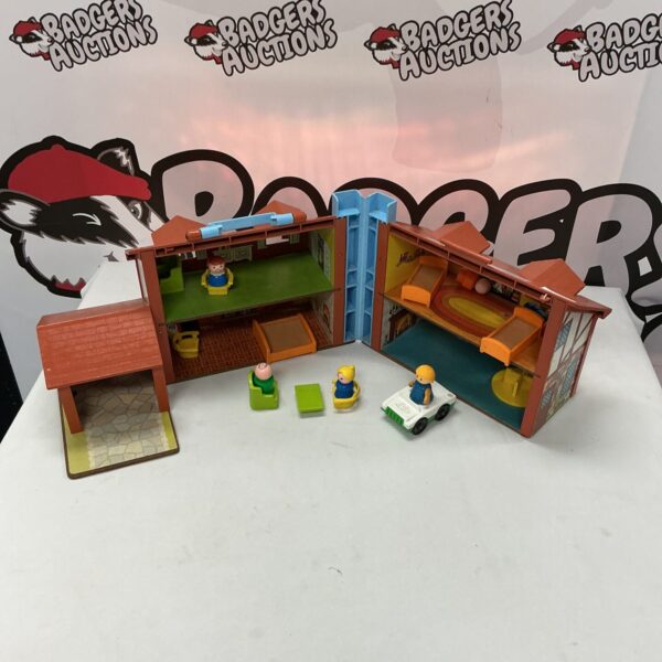 Vintage Fisher Price play house with colourful rooms and figures.