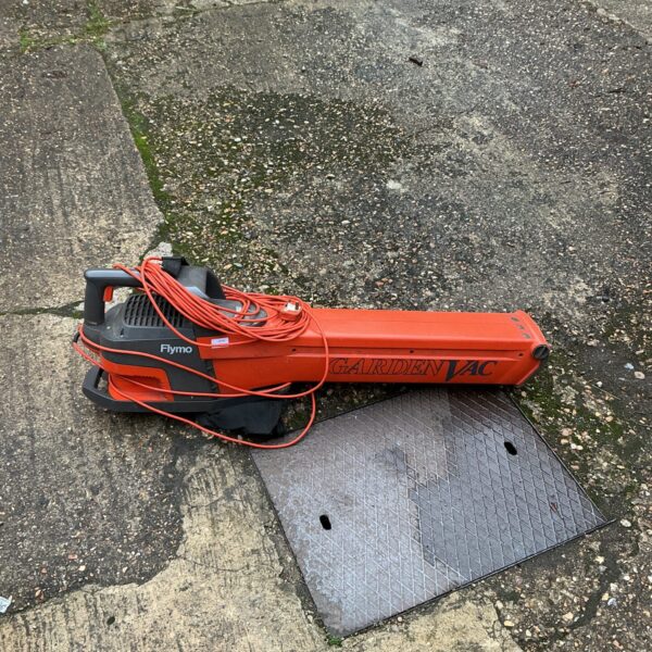 Used Flymo electric lawn vac for garden cleaning and maintenance.