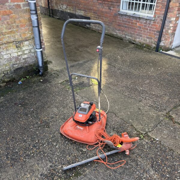 Flymo Turbo Trim XL400 petrol mower and EHT 530 electric hedge cutter for garden maintenance.