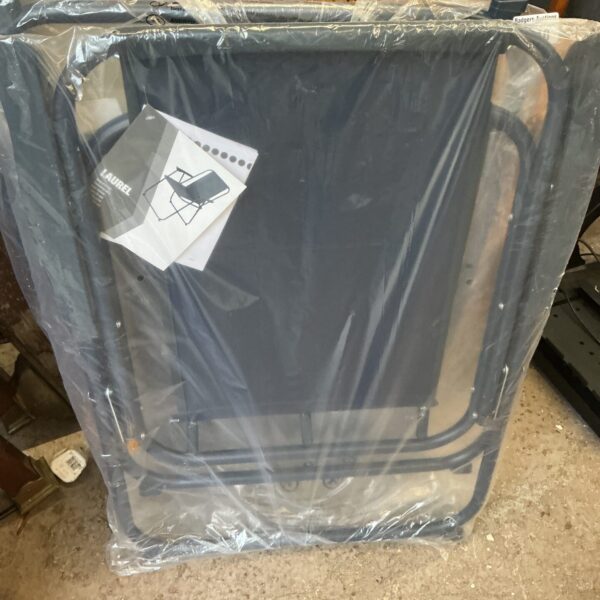 Two metal folding garden chairs for outdoor patio seating.