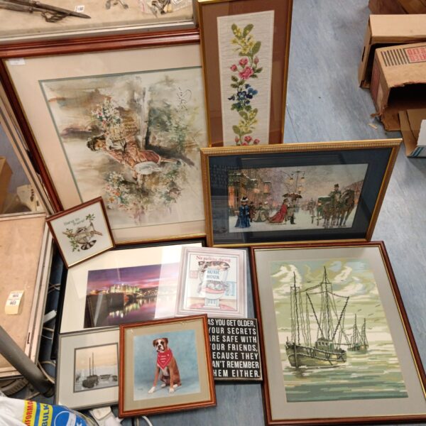 Vintage lot of framed prints and embroidery for wall decoration.
