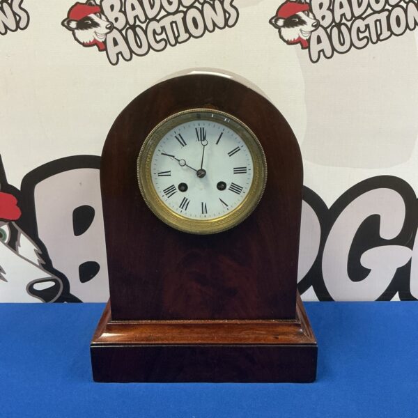 Antique French mantle clock by G & S with brass face.