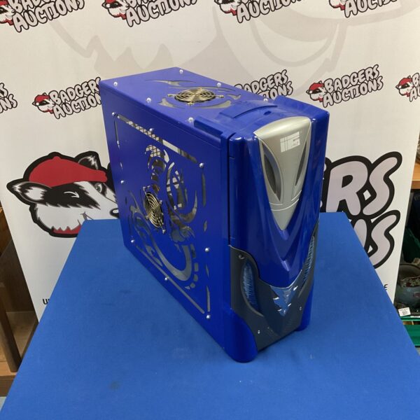 Blue gaming PC case with a dragon design on the front panel.