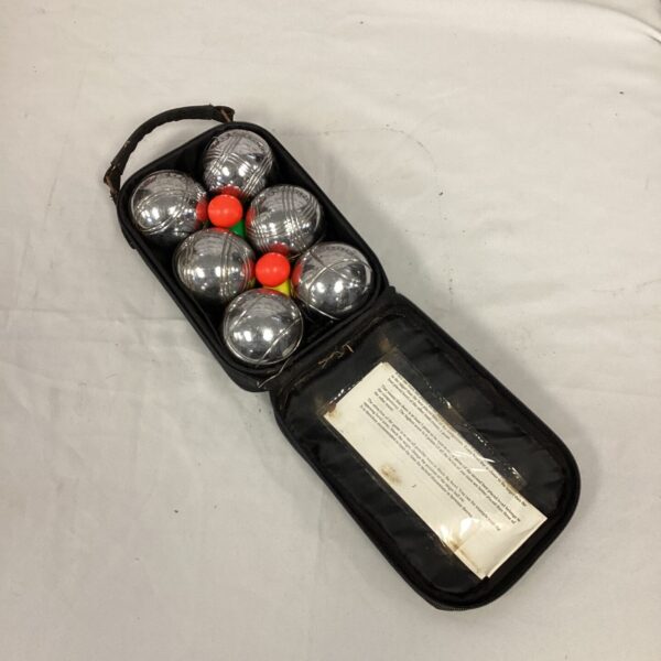 Garden boules set with metallic boules inside a fabric carrying case.