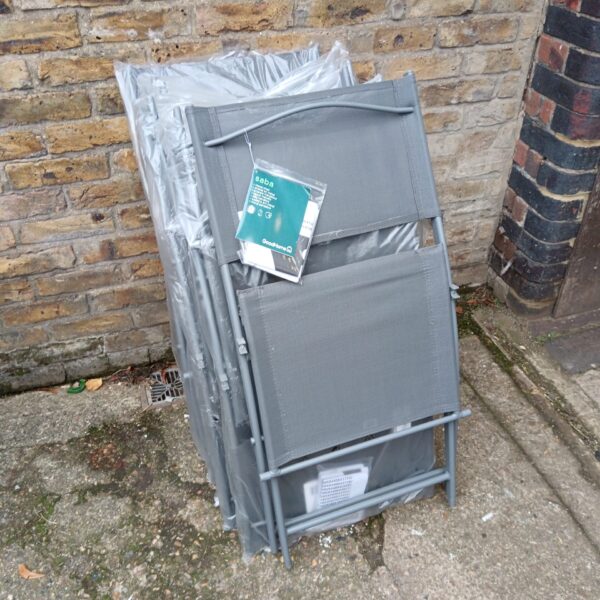 Stack of six new goodhome Saba metal garden folding chairs.