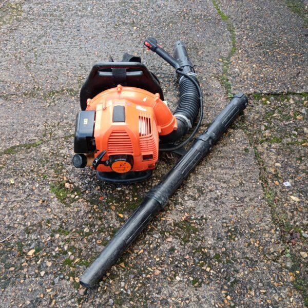 Garden Pride petrol leaf blower for clearing garden debris.