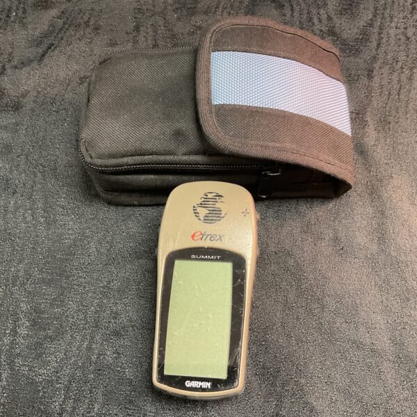 Vintage Garmin etrex handheld GPS with protective case.