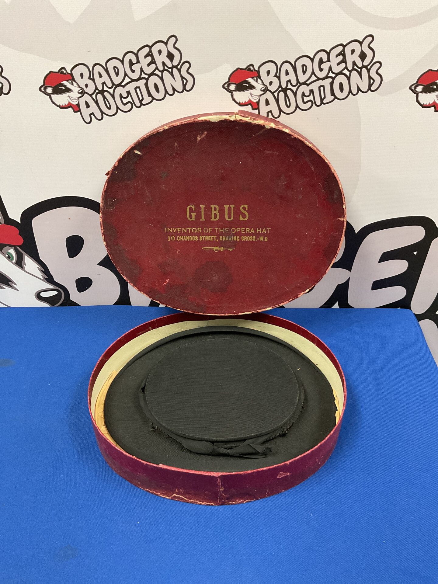 Antique Gibus folding opera hat in its original presentation box.
