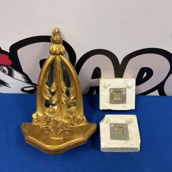 Vintage gilt sconce mould with intricate baroque detailing.