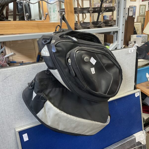 Black Givi arrowbag motorcycle pillion bag for storage.