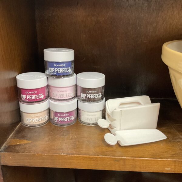 Collection of Glamdip Dip Perfect dip powder pots for nail art.