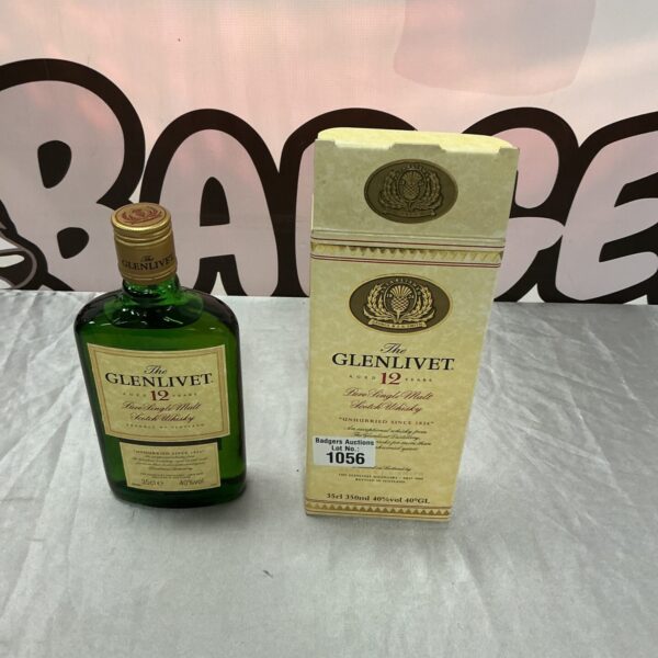 Half bottle of Glenlivet 12 year old single malt Scotch whisky.
