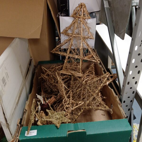 Gold wicker Christmas decorations for festive holiday displays.