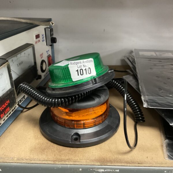 Green and amber beacon light for vehicles and equipment.