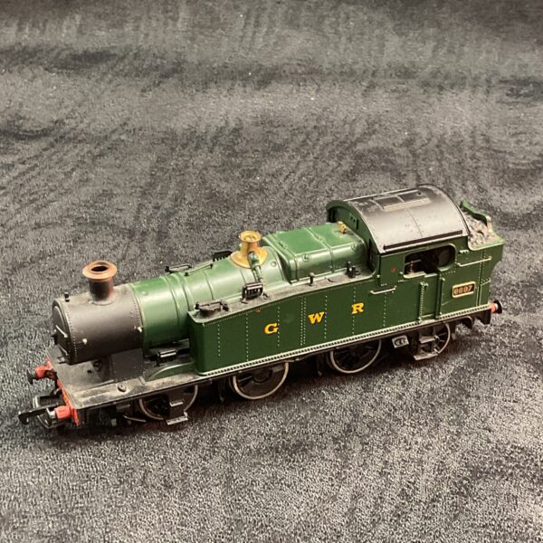 Detailed GWR OO gauge tank engine in green livery.