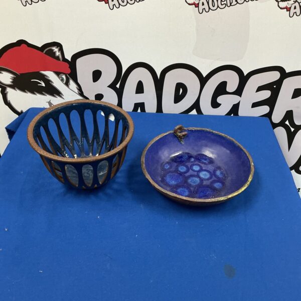 Vibrant glazed handmade pottery fruit bowl for kitchen display.