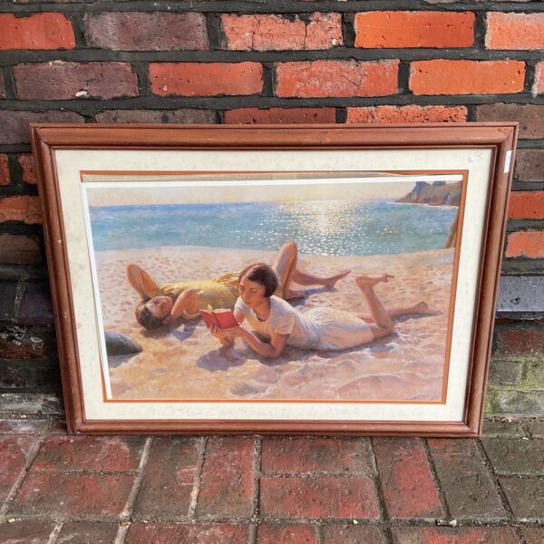Vintage Harold Harvey print of girls reading on a peaceful beach.
