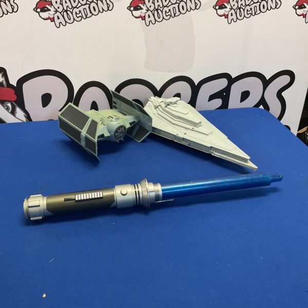 Hasbro Star Wars ships with lightsaber, vintage collectible toys.