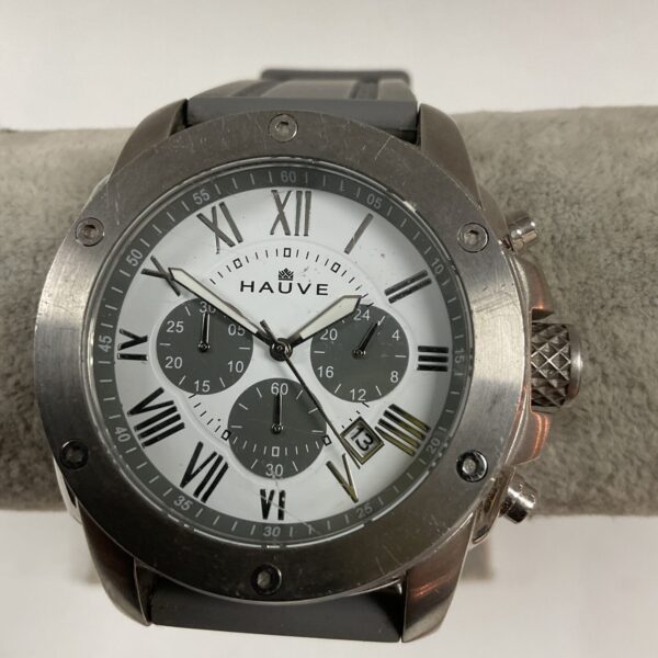 Hauve quartz wristwatch with dark dial and hour markers.