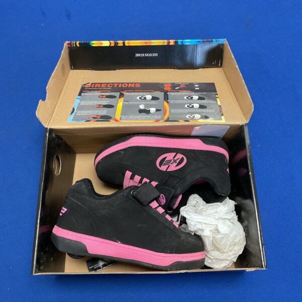 Black and pink Heelys trainers UK size 12 with wheel.
