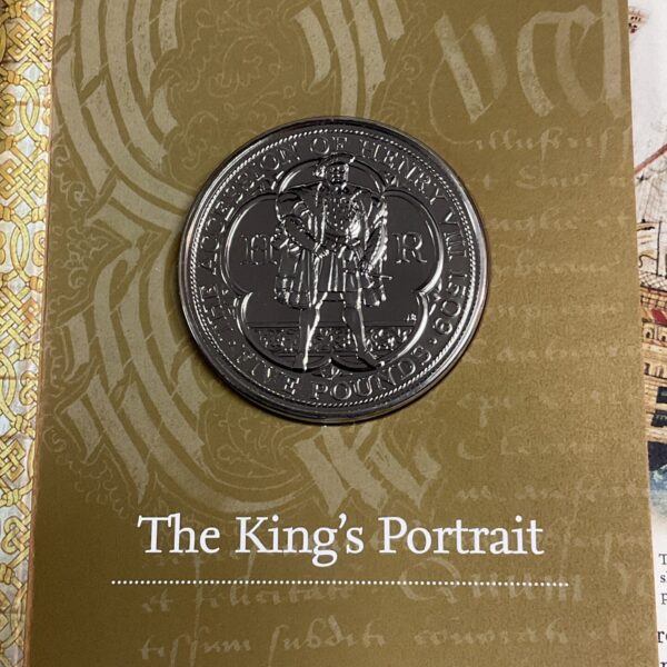 Front view of the Royal Mint Henry VIII five pound coin.