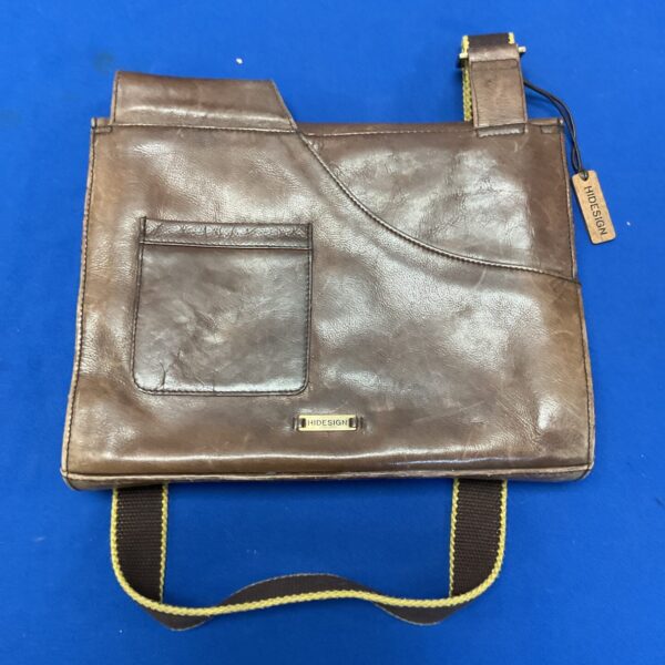 Vintage brown leather Hidesign Lever satchel with adjustable strap.
