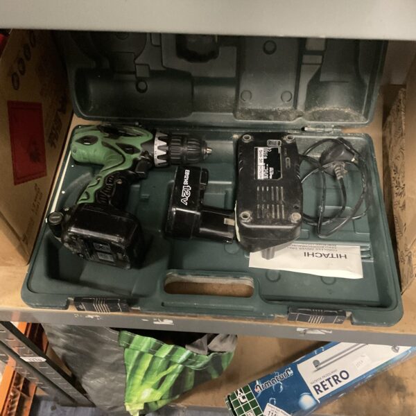 Vintage Hitachi DB9DV 9.6V cordless drill set in carrying case.