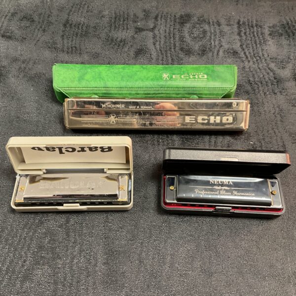 Vintage harmonicas including Hohner Echo, Baclay and Neuma.