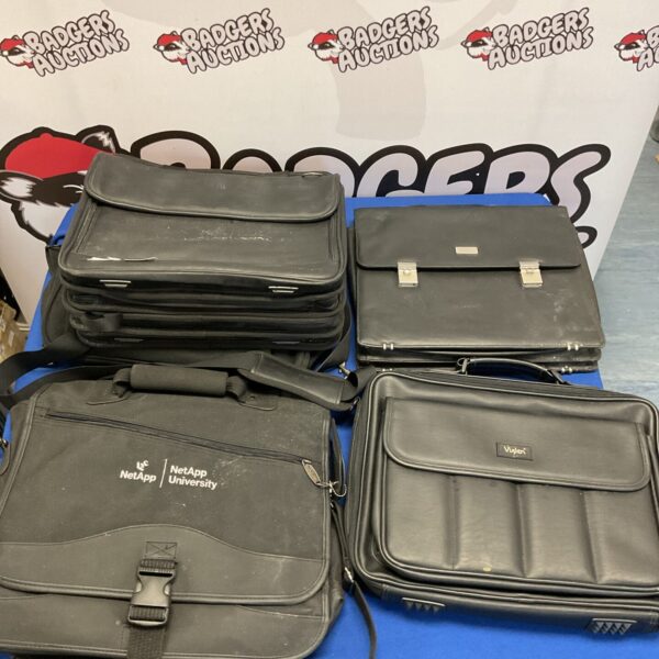 Selection of holdalls and briefcases including NetApp and Fujitsu Siemens brands.