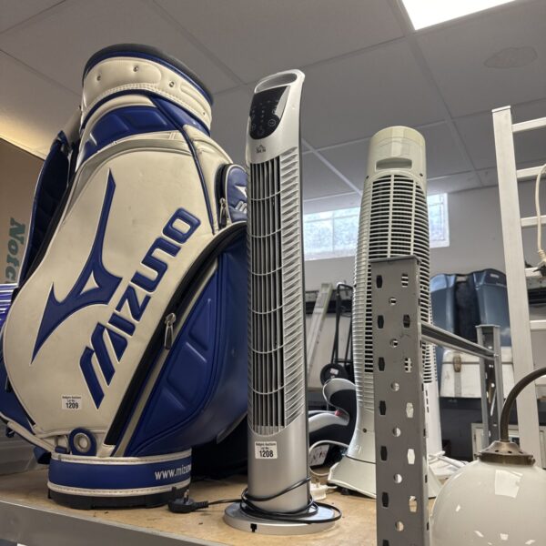 Silver Homcom tower fan standing on a floor.