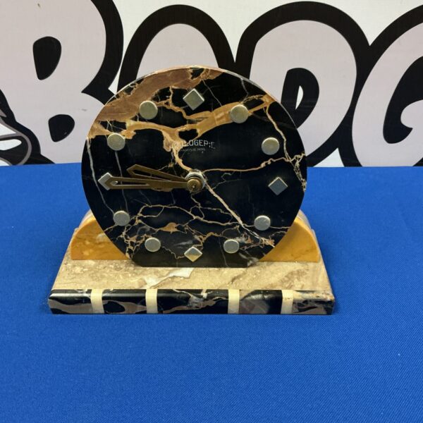 Antique Horlogerie Parisienne mantle clock with dark marble case.