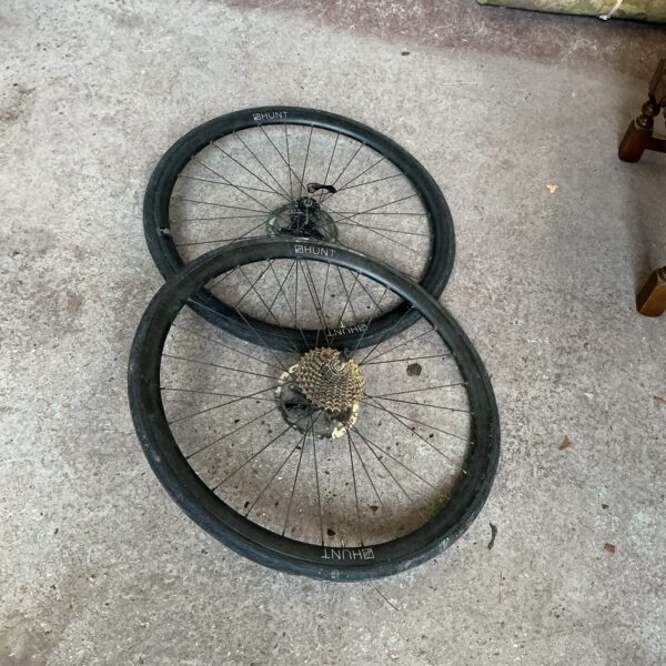 Black Hunt bike wheels with disc brake compatibility for road cycling.