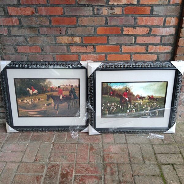 Pair of framed hunt scene prints for country home decor.
