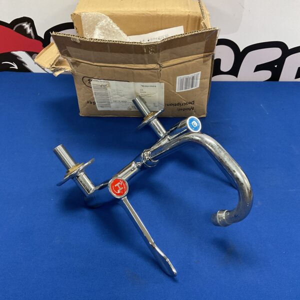 Pair of wall mounted lever handled taps new old stock potters/craft use