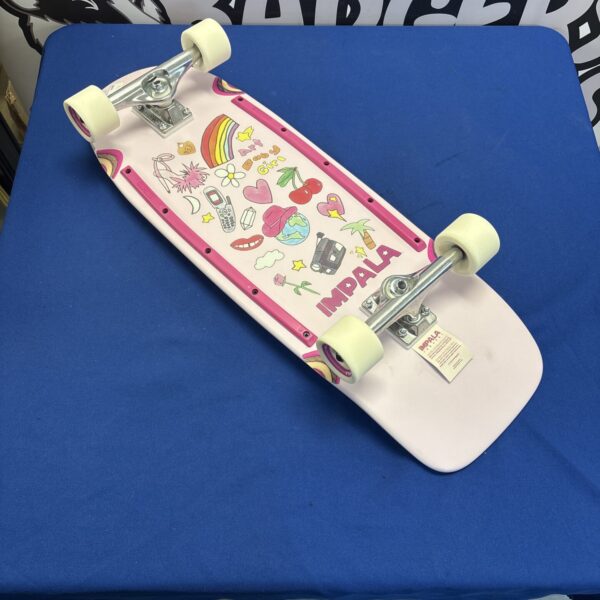 Vibrant Impala Latin Cruiserboard with colourful design and Tensor trucks.