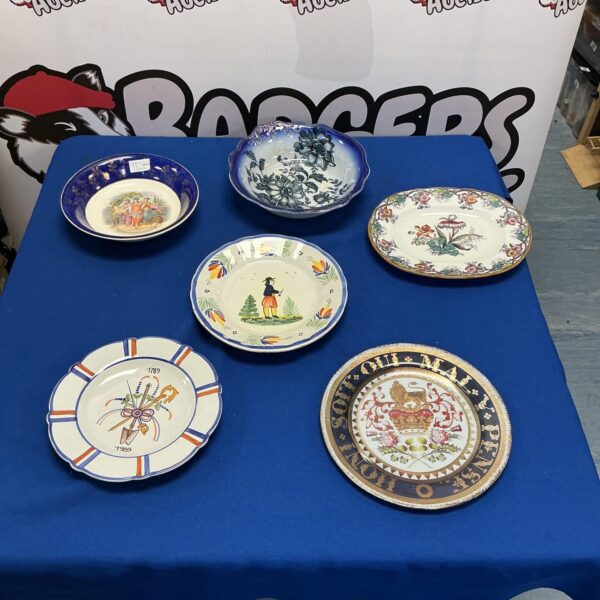 Vintage Imperial Crown Porcelain plates with floral designs.