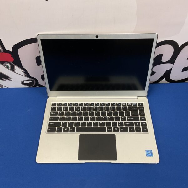Silver iOTA 2310 laptop, compact portable computer.
