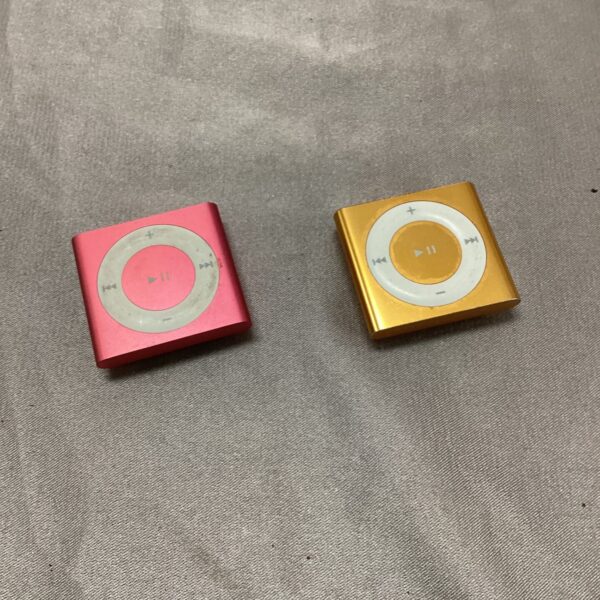 Red Apple iPod Nano 2nd generation portable music player.