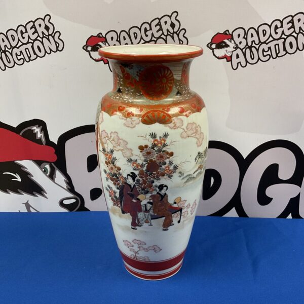 Antique Japanese Kutani vase with figures and foliage.