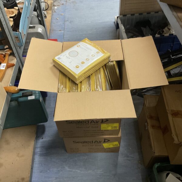 Stack of three boxes containing sealed air jiffy padded envelopes.